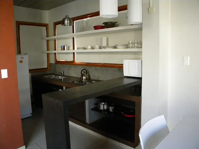 Cocina con barra desayunador